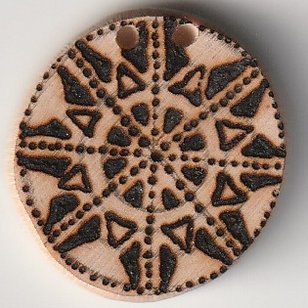 Achtstern Mandala auf Holzscheibe gebrannt