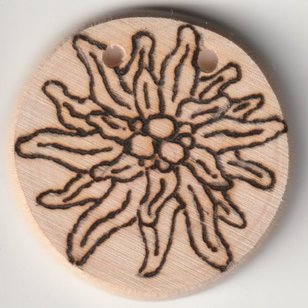 Sonnenbebrannte Holzscheibe mit Edelweiß Motiv
